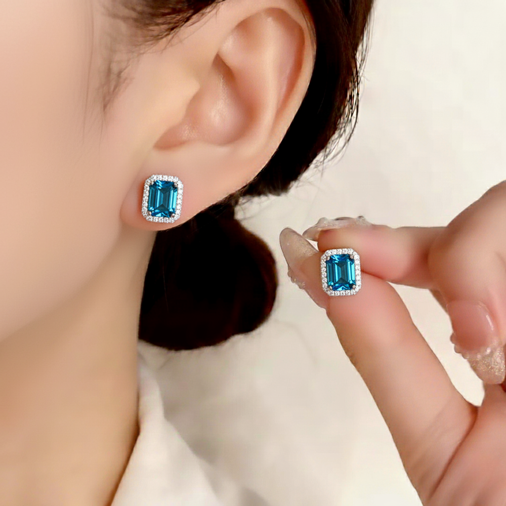 Ocean-Deep Topaz Halo Studs